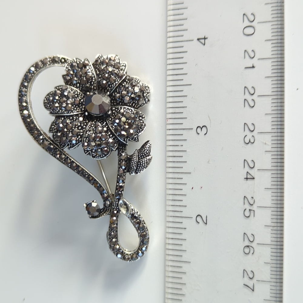 Crystal Infinity Flower Brooch